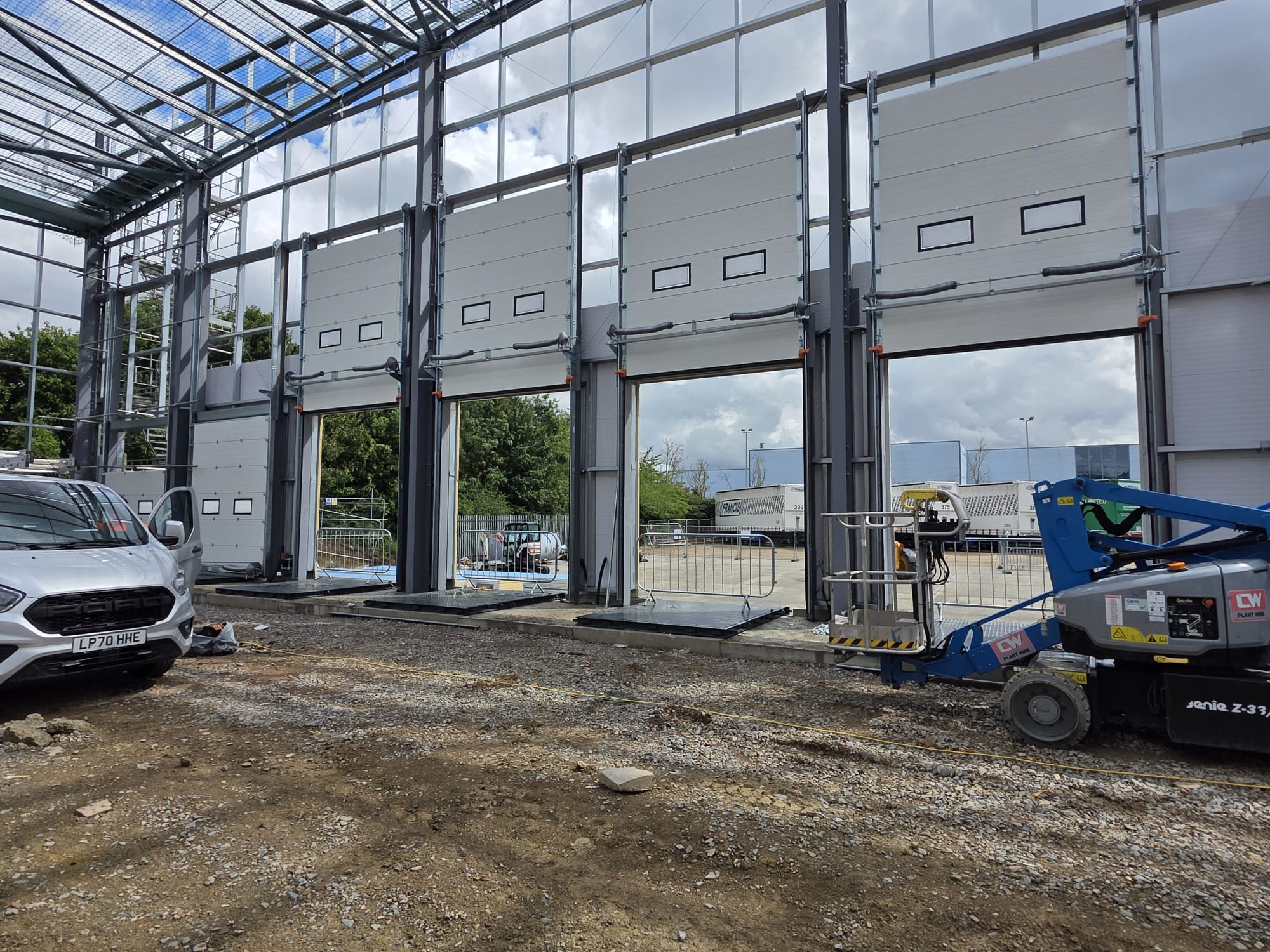 Sectional doors being installed on a new loading bay development