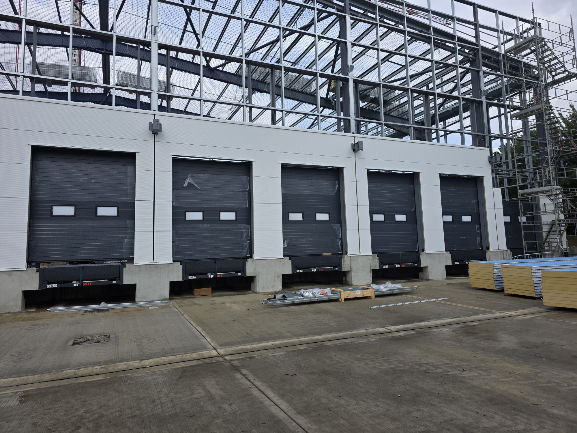 Sectional door and loading bay installation on a new-build project
