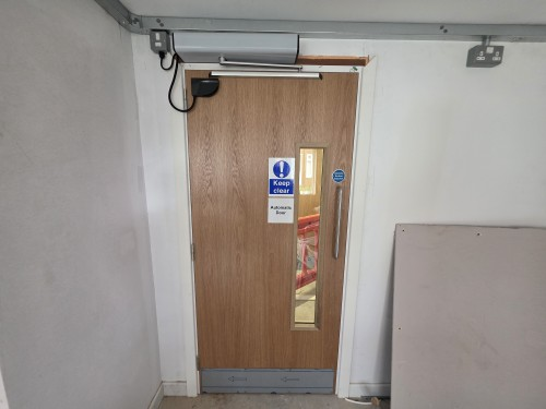 Completed automatic swing-door installation