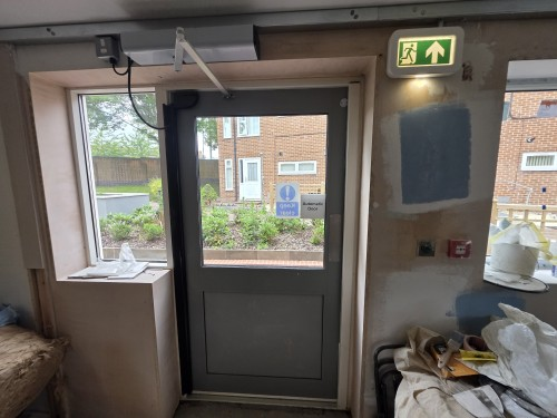 Swing-door automation installation before completion