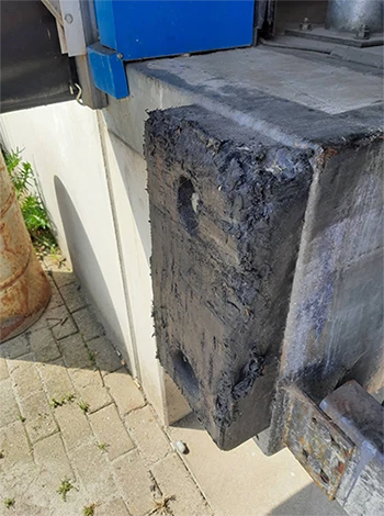 Heavily worn rubber dock buffer requiring inspection