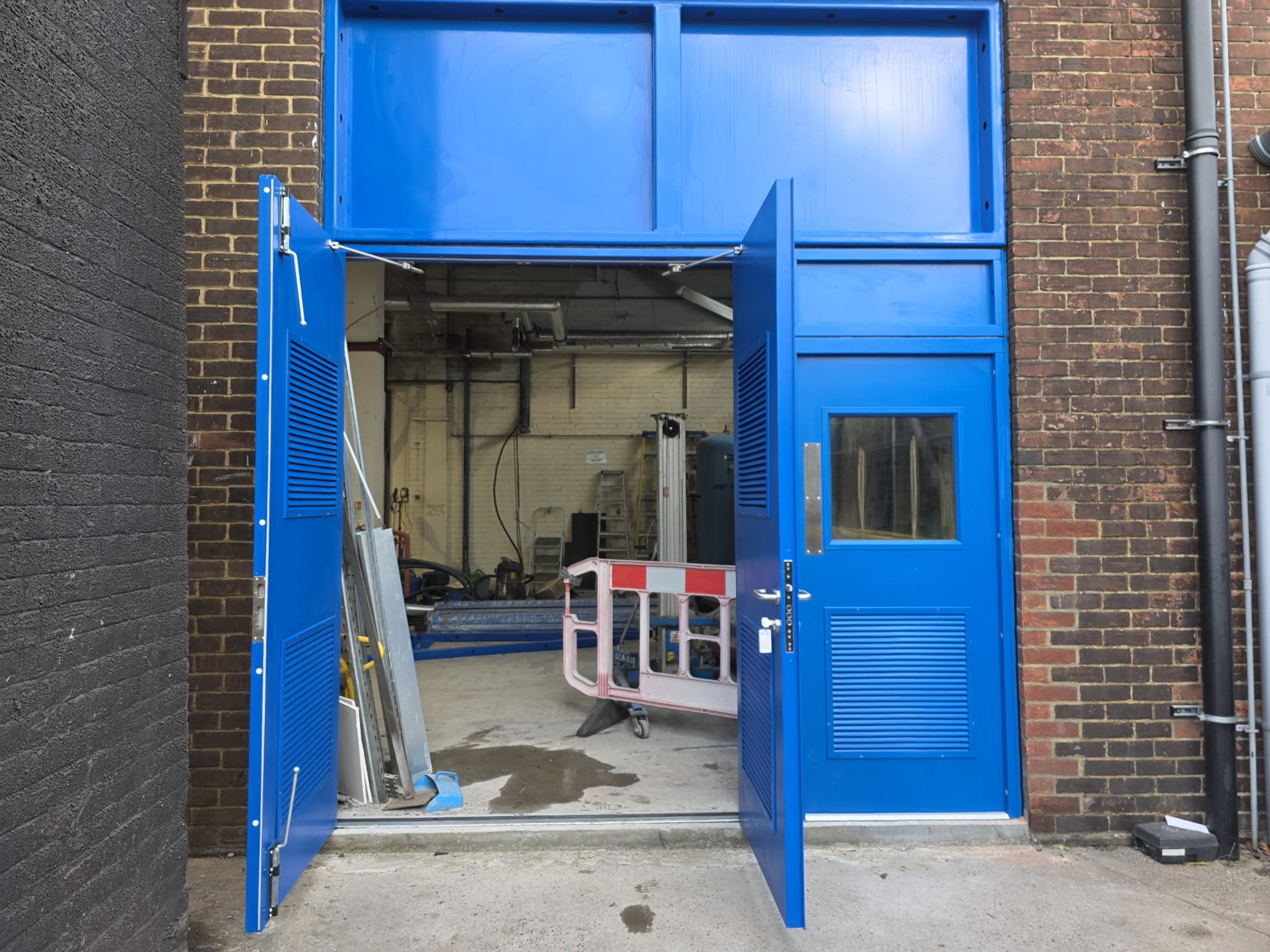 EVICK blue steel double doors shown open