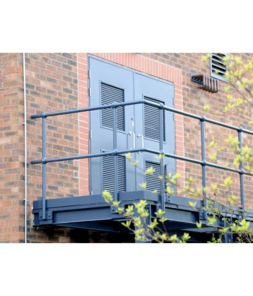 Grey double steel doors with ventilation louvres