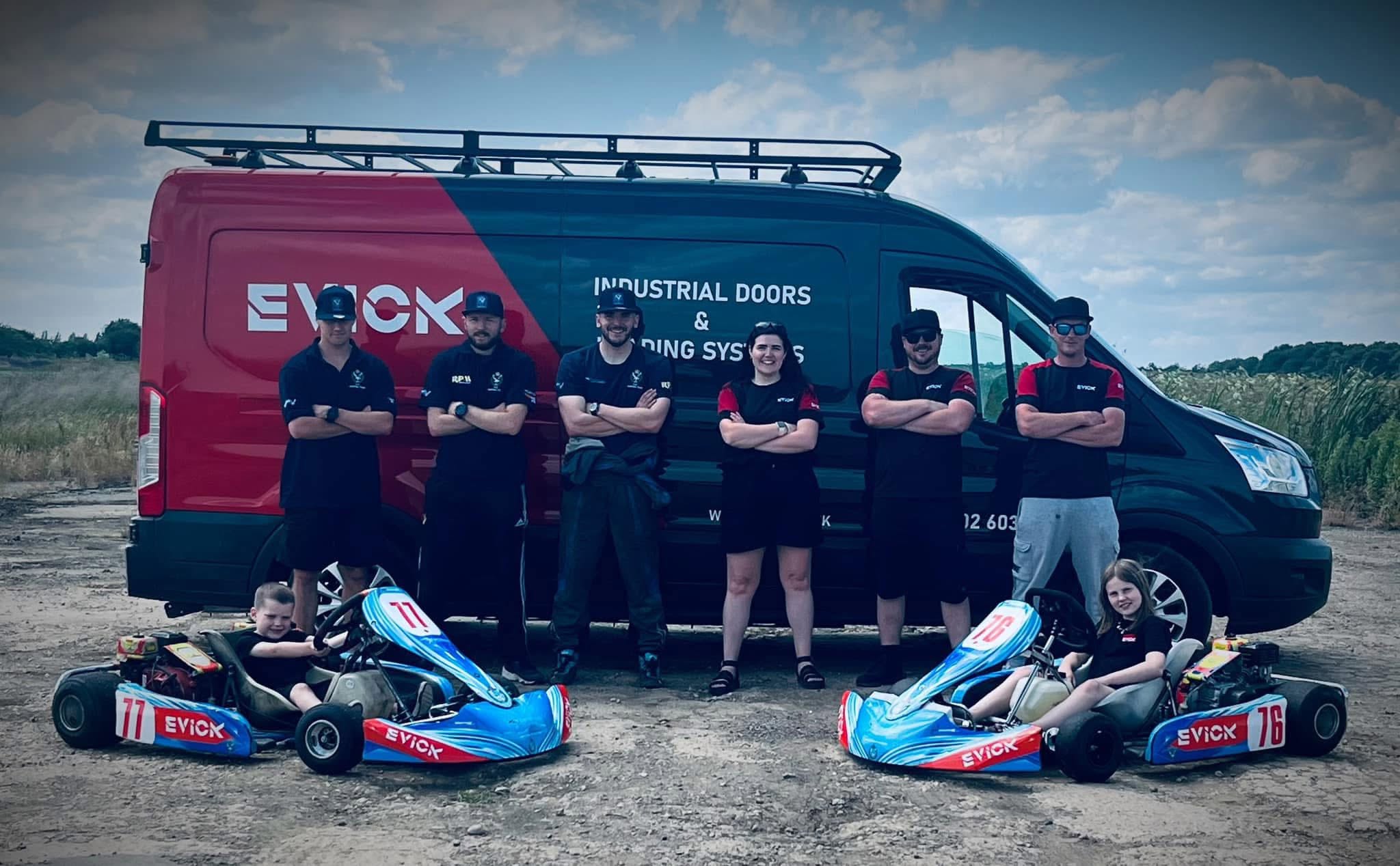 Army Air Corps go-karting team with EVICK van